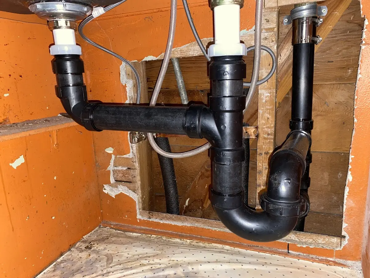 Professional Garbage Disposal Repair equipment and tools on the job in Park Rapids